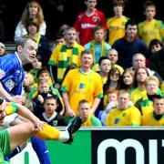 Alan Quinn scores against Norwich