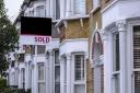British houses with sold sign