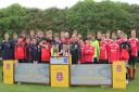 Walsham-le-Willows Under-14s and Under-16s pictured with their two trophies at Suffolk Youth Cups finals day. Picture: SUFFOLK FA