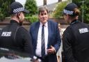 Policing minister Kit Malthouse chats to officers during his visit to Ipswich.