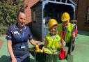 Children's department sister Faye Button with six-year-old Scarlett and chief executive Nick Hulme