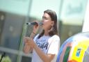 Young Ipswich singer Roma Nicholson busked her way around the Elmer trail - singing 55 songs at 55 Elmer's in aid of St Elizabeth Hospice  Picture: SARAH LUCY BROWN
