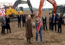 Mid Suffolk Council leader Suzie Morley breaks the ground for the Gateway 14 project in April alongside project chair Sir Christopher Haworth