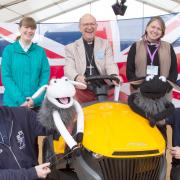 The Church of England has provided fun activities on its stand at the Suffolk Show. Back L-R: Julie Daniels, Grace Kent, Bishop Martin Seeley, Sarah Duboulay, Lorna Todd. Front L-R: James Gibson and Ben Alty with their puppets.