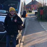 Passenger Victoria Broomhead, who has now moved to Cambridge, with the 387 bus in Gislingham, which will be axed at the end of the month