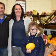 The Field of Dreams farm shop has moved offsite to nearby Woolpit. Pictured are Sue Smith, her partner Mark Byford and Sue's granddaughter Amelia Crick, seven, in the shop