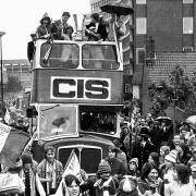 Ipswich Town fans celebrate with the team as they parade the UEFA Cup in 1981. You're not on here, surely?