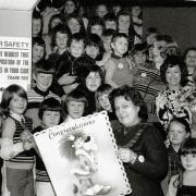 Mayor of Felixstowe Win Knight with children from the Saturday morning cinema club and a card from the Film Foundation in April 1976