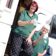 Ann Osborn and founder Sally Fogden of the Rural Coffee Caravan which visits villages across Suffolk to help combat loneliness Picture: SARAH LUCY BROWN