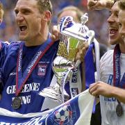 pswich Town goalscorers Richard Naylor, Tony Mowbray, Martijn Reuser and Marcus Stewart with the trophy, after they defeated Barnsley 4-2 in their Division 1 play-off final at Wembley Stadium, London, in 2000      Picture: Rebecca Naden/PA Images
