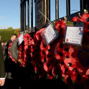 Gathering at the Memorial Gates by the Recreation Ground in Stowmarket for the Remembrance Day wreath laying ceremony.

PICTURE :Andy Abbott